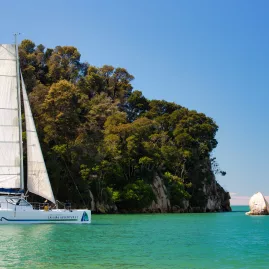 Sailing past Split Apple Rock with Abel Tasman Sailing Adventures