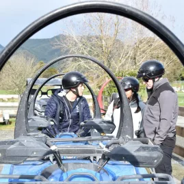 Group receives safety briefing before an ATV ride at Cable Bay Adventure Park’s Bayview Circuit.