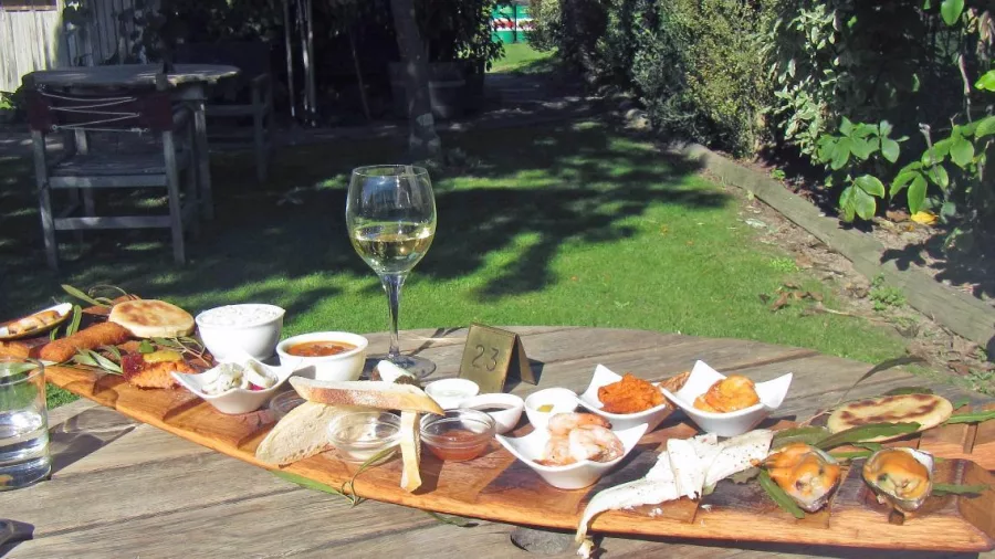 Petit Fleur tasting platter with wine on Moutere Hills E-bike tour