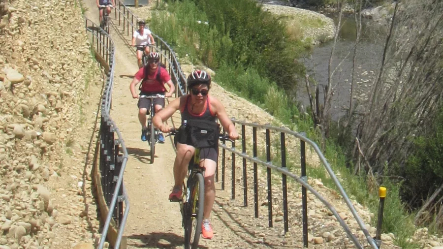 Cyclists on Wai-iti Riverbank Trail with Nelson Cycle Hire