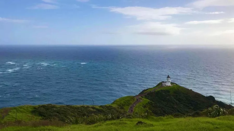 Cape Reinga Lighthouse overlooking the meeting point of the Tasman Sea and Pacific Ocean