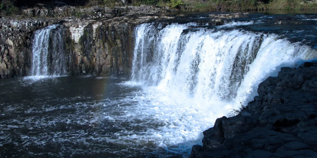 Water cascading over Haruru Falls near Paihia in the Bay of Islands