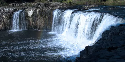 Water cascading over Haruru Falls near Paihia in the Bay of Islands