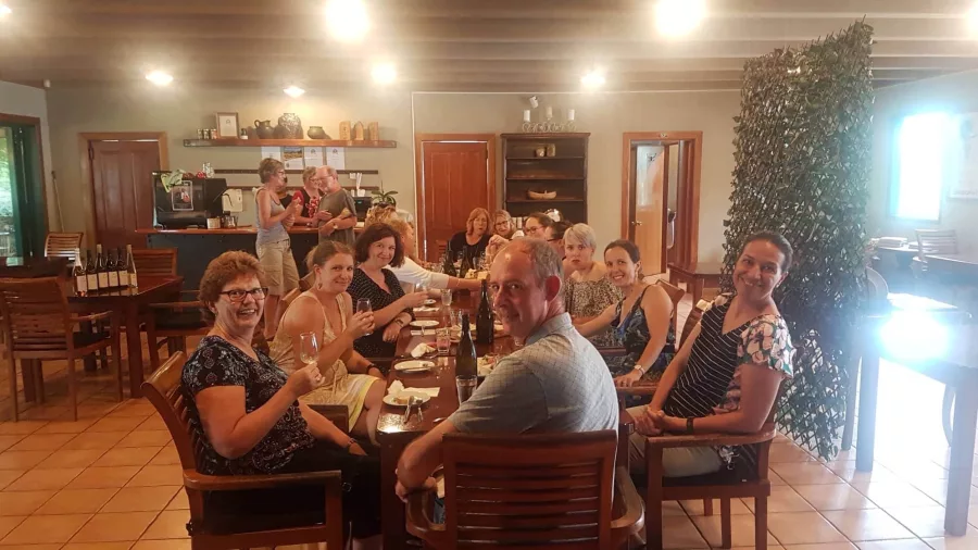 Group of people enjoying a wine tasting indoors at Marsden Estate in Bay of Islands