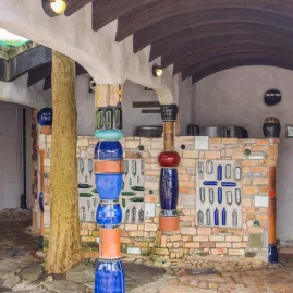 Exterior view of the colourful and artistic Hundertwasser public toilets in Kawakawa