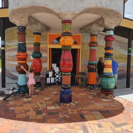 Hundertwasser Art Centre entrance with colorful columns in Whangārei, New Zealand