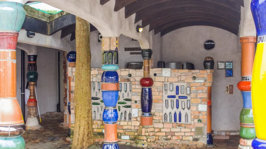 Exterior view of the colourful and artistic Hundertwasser public toilets in Kawakawa