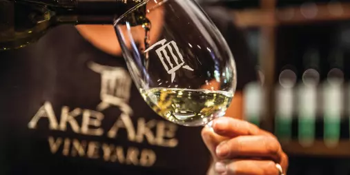 Cheese and charcuterie platter with Marsden Estate wine and two glasses in Kerikeri