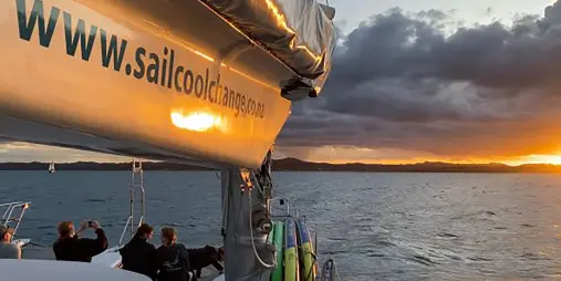 Sunset sailing on Cool Change catamaran in the Bay of Islands