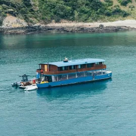 The Rock Adventure Cruise vessel anchored in the Bay of Islands