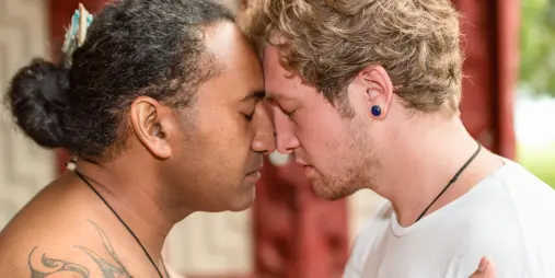 Two men greeting each other with a hongi at Waitangi Treaty Grounds, Northland, New Zealand