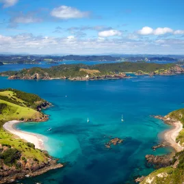 Panoramic coastal view of the Bay of Islands with scattered islands and turquoise water