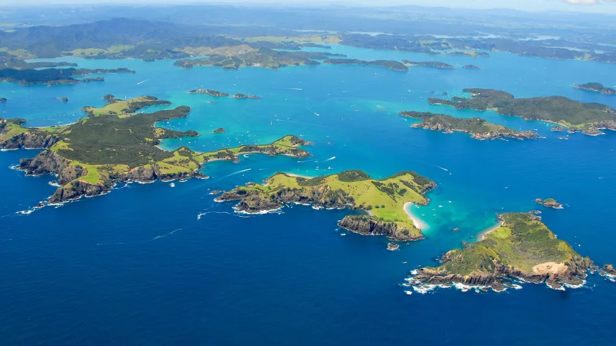 Stunning seascape of the Bay of Islands with scattered islets and sparkling blue waters