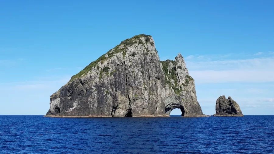 Piercy Island with the famous Hole in the Rock formation in the Bay of Islands