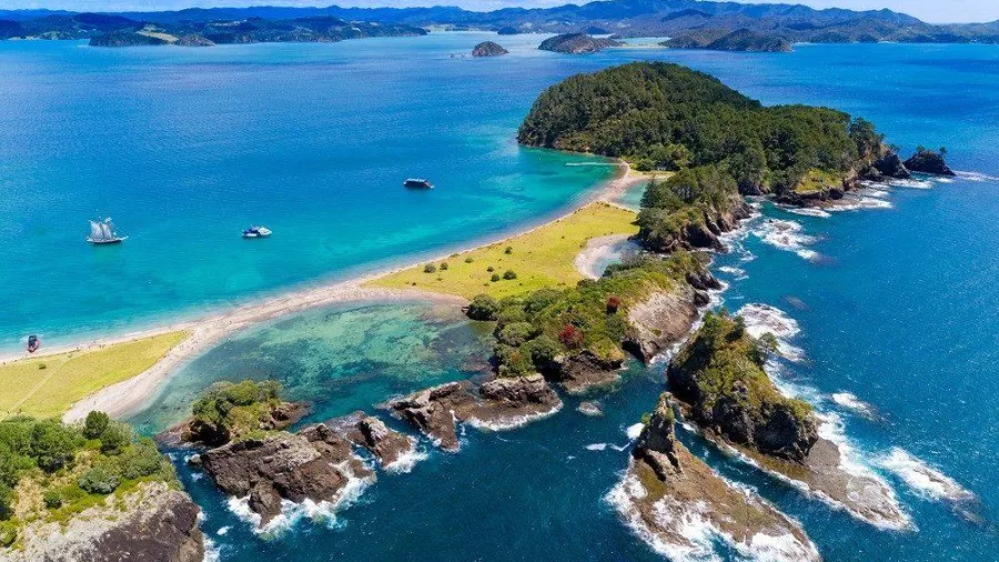 Aerial view of Motuarohia (Roberton Island) with twin lagoons in the Bay of Islands