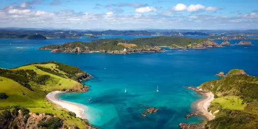 Panoramic coastal view of the Bay of Islands with scattered islands and turquoise water