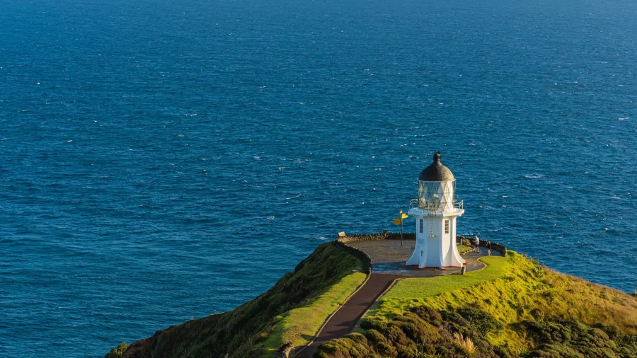 Cape Reinga Lighthouse, where the Tasman Sea meets the Pacific Ocean, is one of New Zealand’s most iconic landmarks.