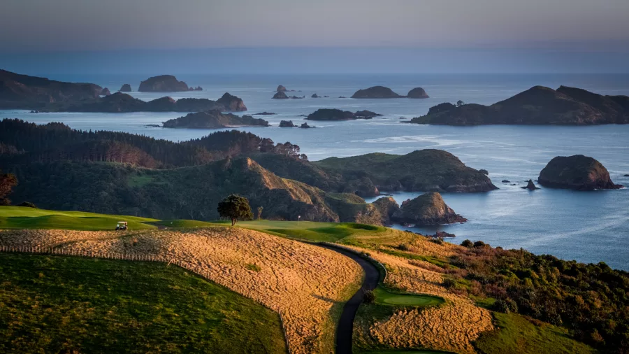 View from Kauri Cliffs Golf Course towards rocky islands in the Bay of Islands, New Zealand