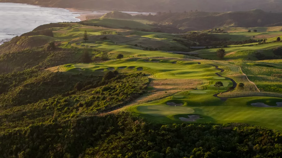 Aerial view of Kauri Cliffs Golf Course with the Pacific Ocean coastline, Bay of Islands, New Zealand