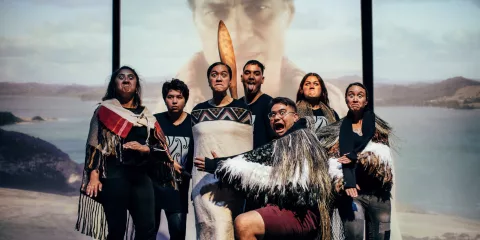 Group of Māori performers expressing traditional haka and facial gestures at Manea Footprints of Kupe in Hokianga
