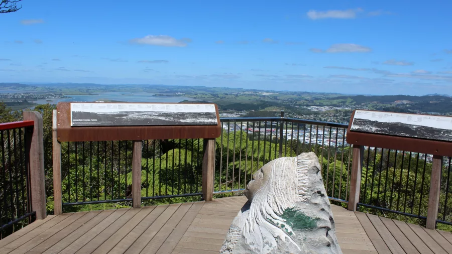 Scenic lookout at Mount Parihaka with panoramic views over Whangārei and information panels
