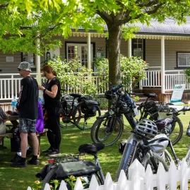 Cyclists enjoying a break at a café in Ranfurly on the Otago Central Rail Trail