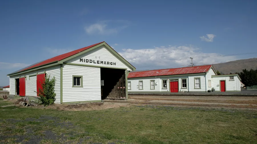 Restored Middlemarch railway buildings with red roofs