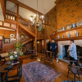 Grand interior staircase of Olveston house in Dunedin