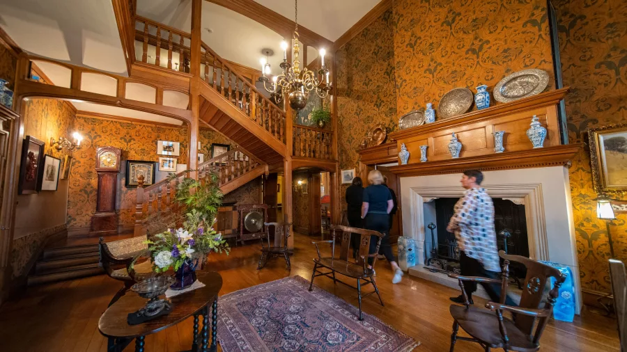 Grand interior staircase of Olveston house in Dunedin