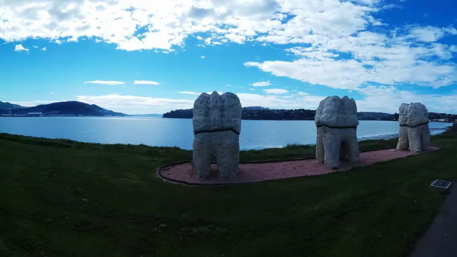 The ‘Harbour Mouth Molars’ sculptures on the waterfront in Dunedin, looking out over Otago Harbour.