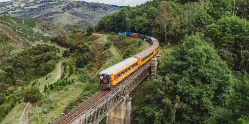 Heritage train crossing the Wingatui Viaduct in Taieri Gorge, Dunedin.