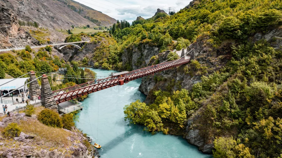 Suspension bridge spanning the Kawarau Gorge over turquoise water