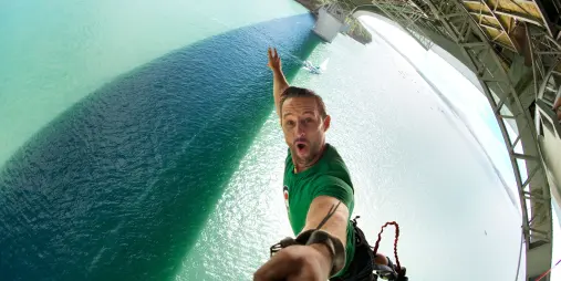 Male Auckland Bridge Bungy jump above Waitematā Harbour