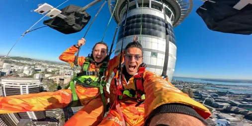 Friends enjoying SkyJump at the Auckland Sky Tower
