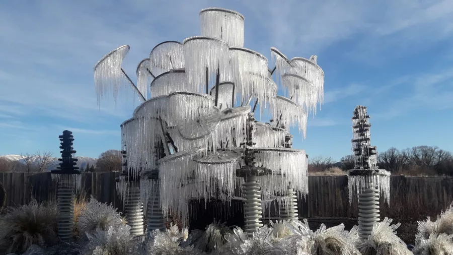 Frozen wheel sculpture in Omarama, Otago