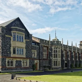 Historic stone buildings of Christ’s College in Christchurch, showcasing Gothic Revival architecture