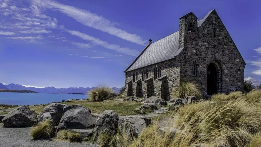 Stone Church of the Good Shepherd with views over Lake Tekapo and the Southern Alps in the background
