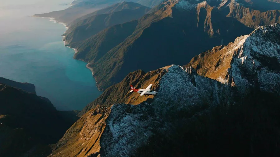 Scenic flight over the rugged Fiordland coastline on return from Milford Sound.