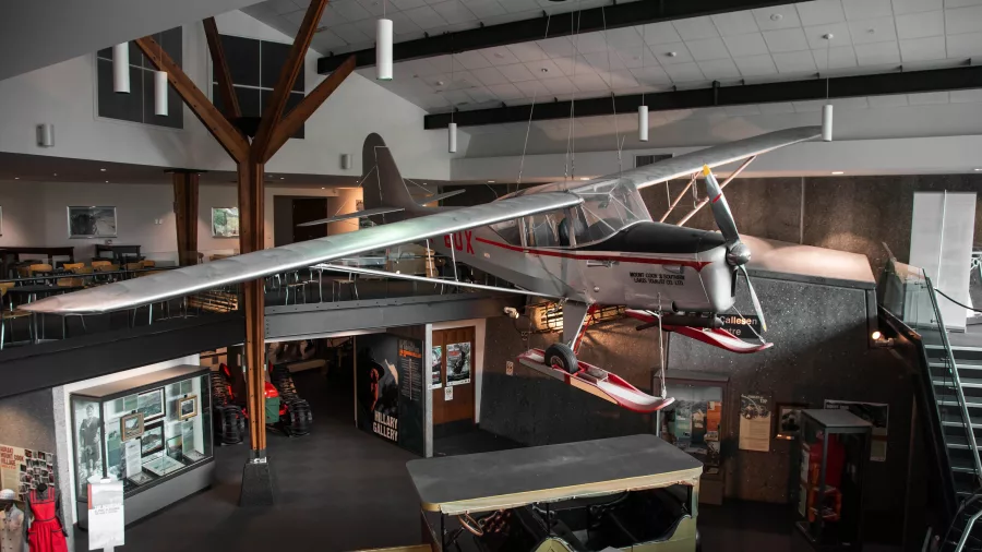 Interior of the Sir Edmund Hillary Alpine Centre featuring a suspended aircraft display