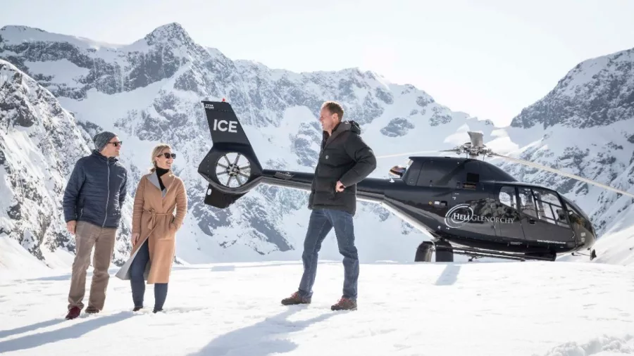 Guests enjoying a guided glacier landing with Heli Glenorchy in the Southern Alps