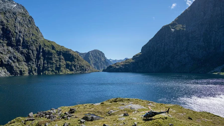 Scenic helicopter landing beside Lake Quill in Fiordland’s alpine wilderness