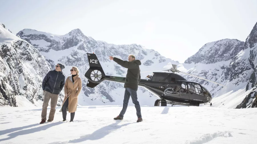 Heli Glenorchy guide leading a private snow landing tour in the Southern Alps