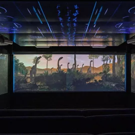 3D animation of dinosaurs on panoramic theatre screens at Time Tripper