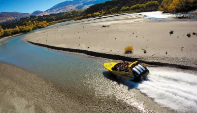 KJet boat navigating a tight bend on the Shotover River
