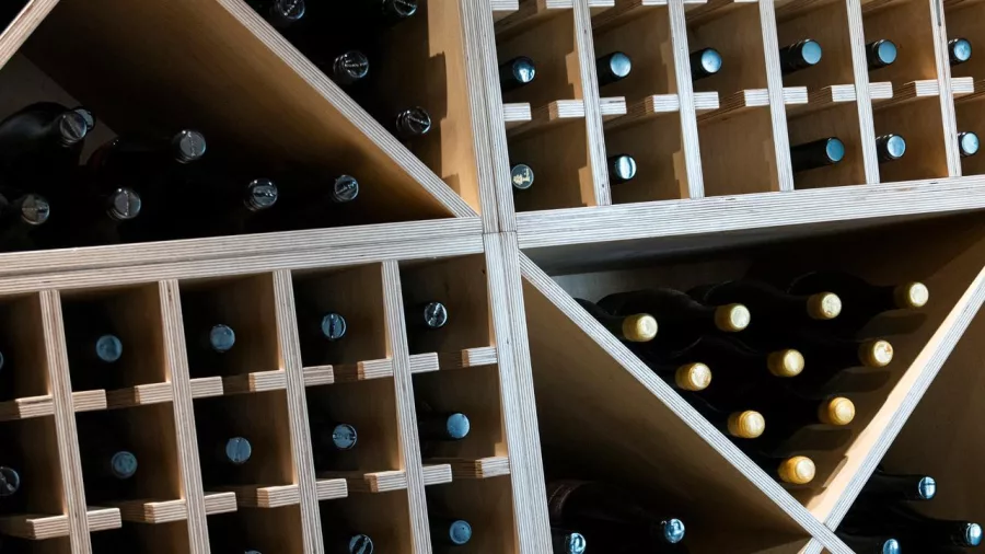 Wine cellar racks filled with premium Central Otago wines at Kinross
