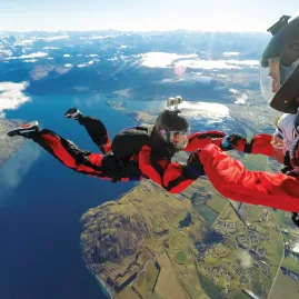 Tandem skydive over Lake Wakatipu with aerial view of Queenstown