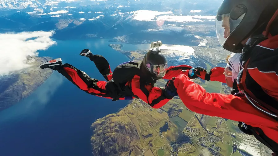 Tandem skydive over Lake Wakatipu with aerial view of Queenstown