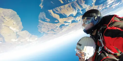 Tandem skydive in an upside-down spin above Lake Wakatipu