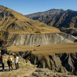 Tour group admiring canyon views during Skippers Canyon 4WD tour