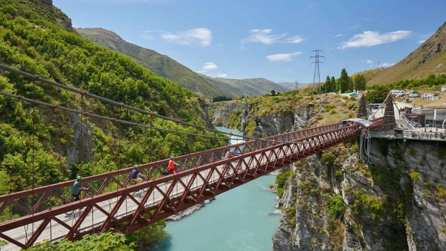 Cyclists riding over the iconic Kawarau Bungy Bridge in Central Otago